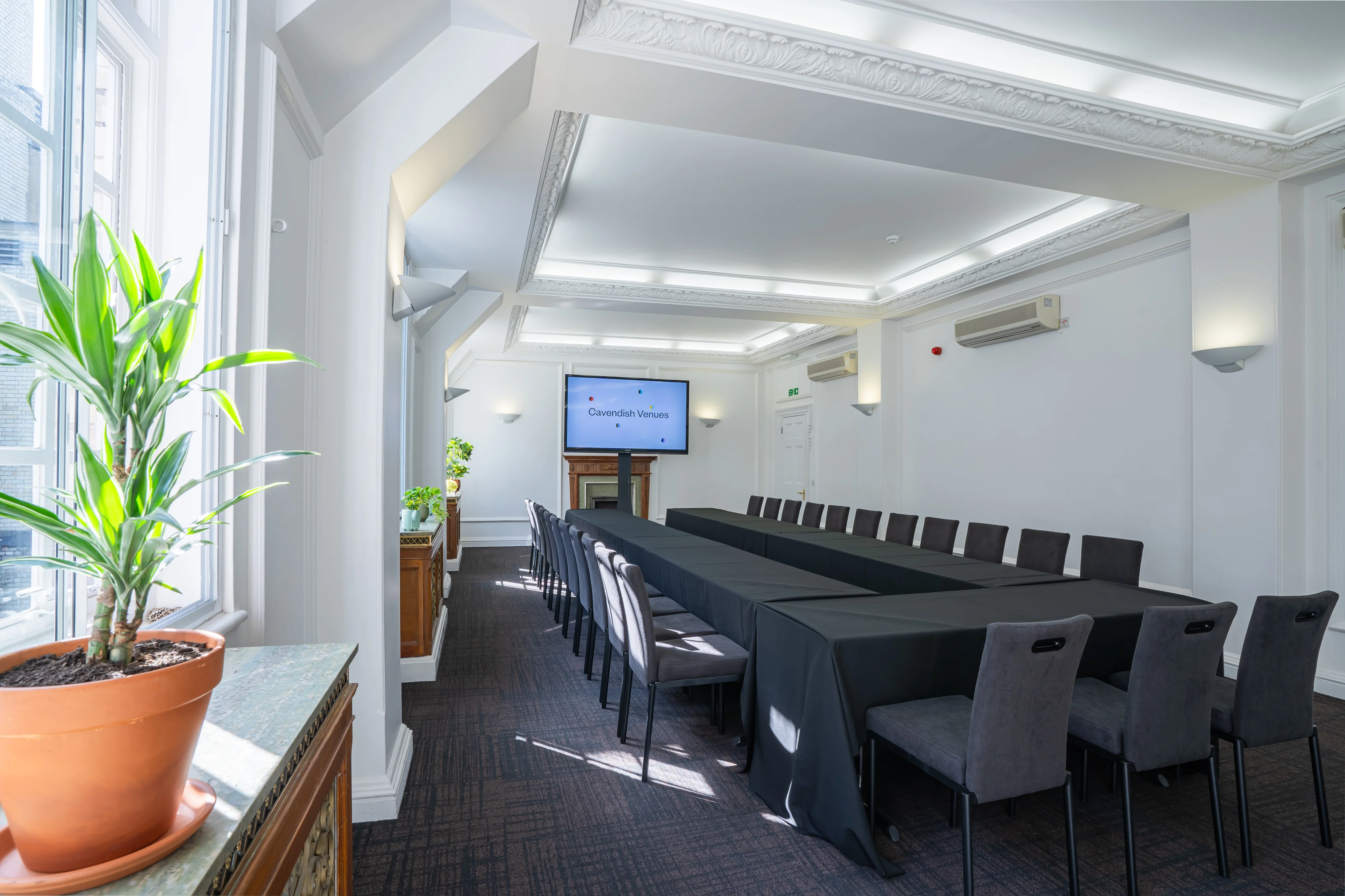 The Warren Suite at 44 Hallam Street set out boardroom style