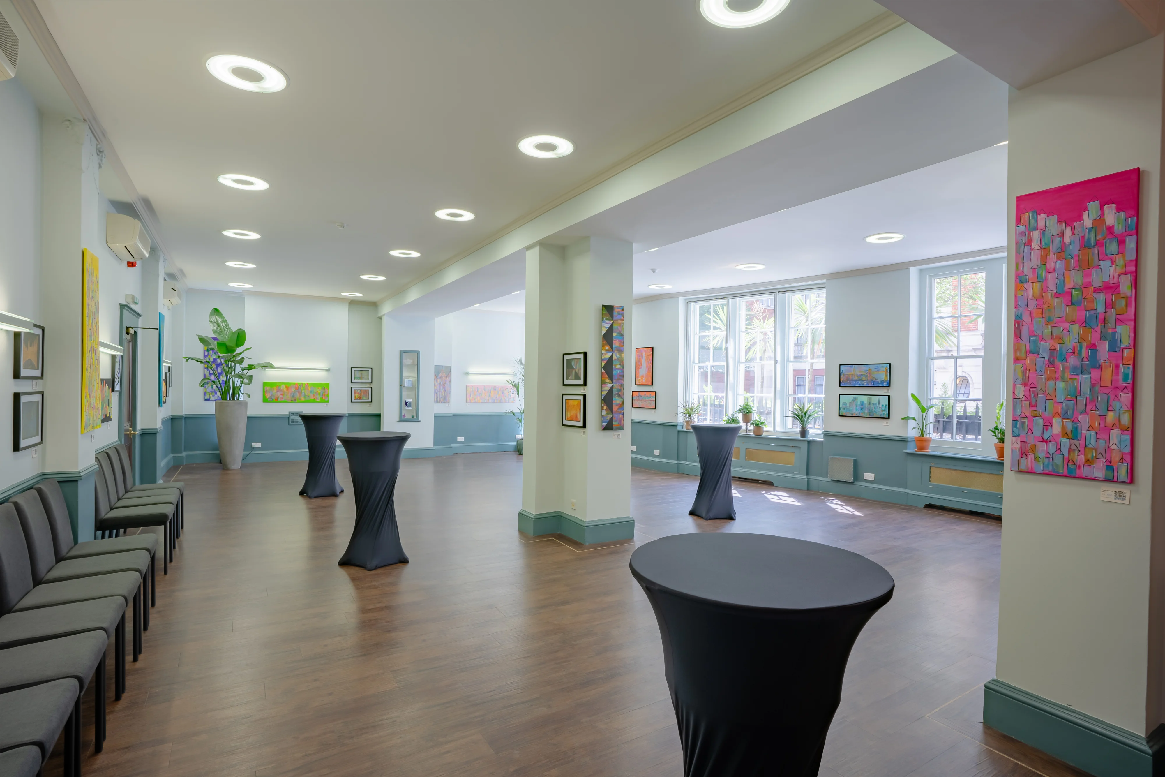The Regent Suite at 44 Hallam Street set up with poseur tables for a reception