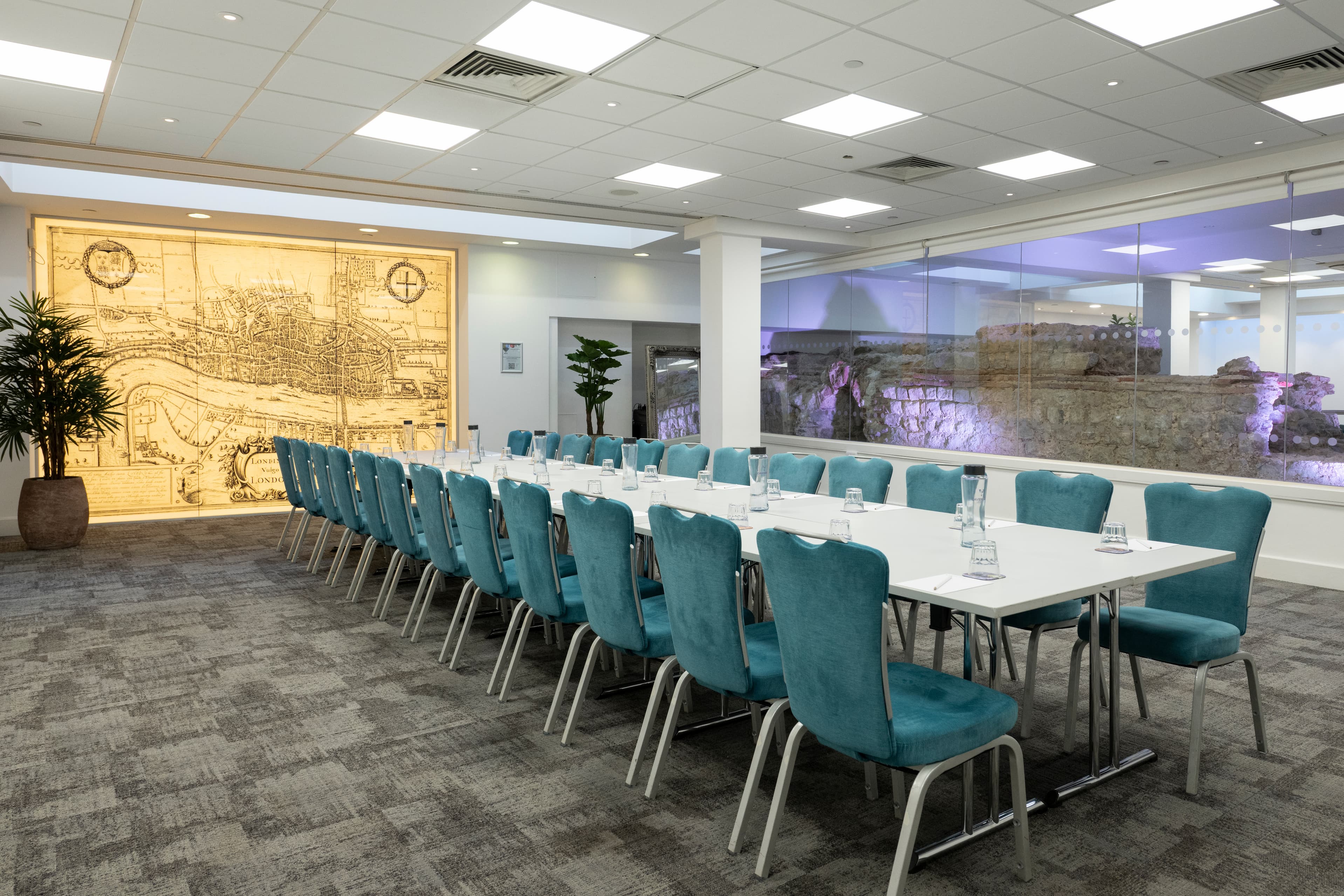 The Walbrook Suite at 1 America Square, set out boardroom style beside a historic map mural of London