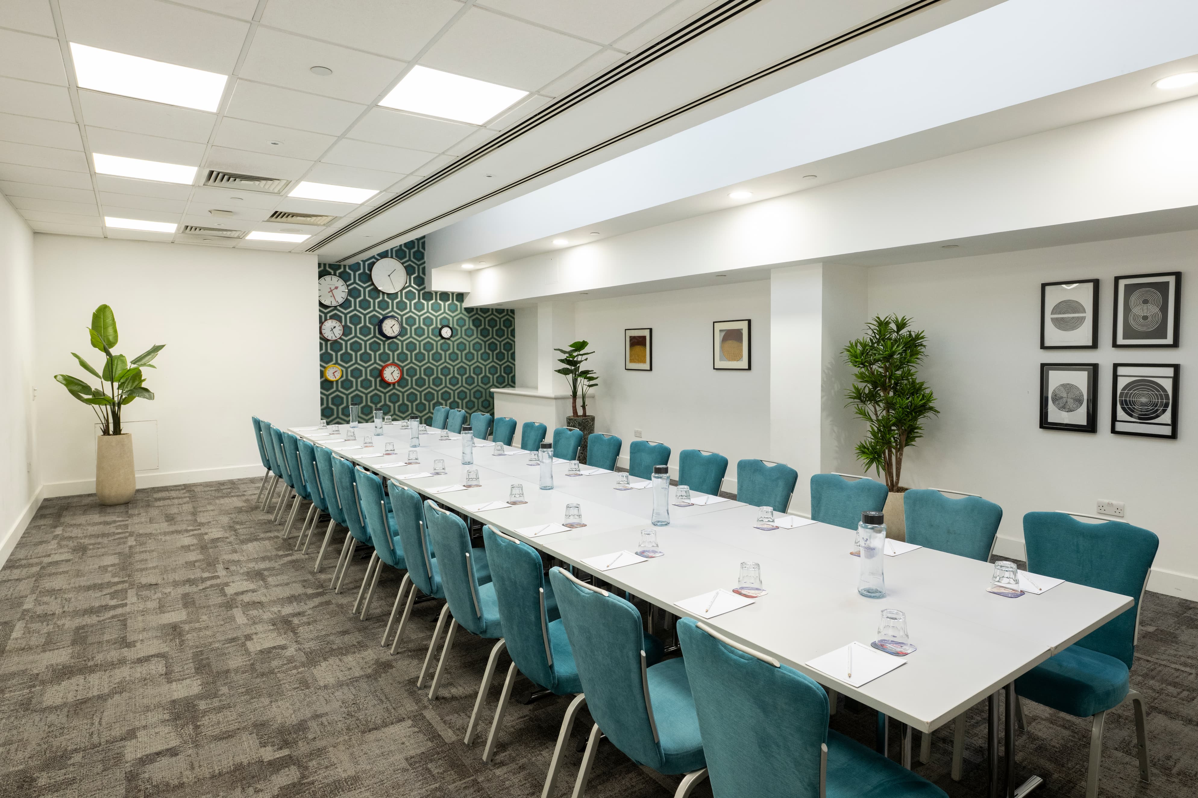 The Newgate Suite at 1 America Square, set out boardroom style with framed prints along the wall