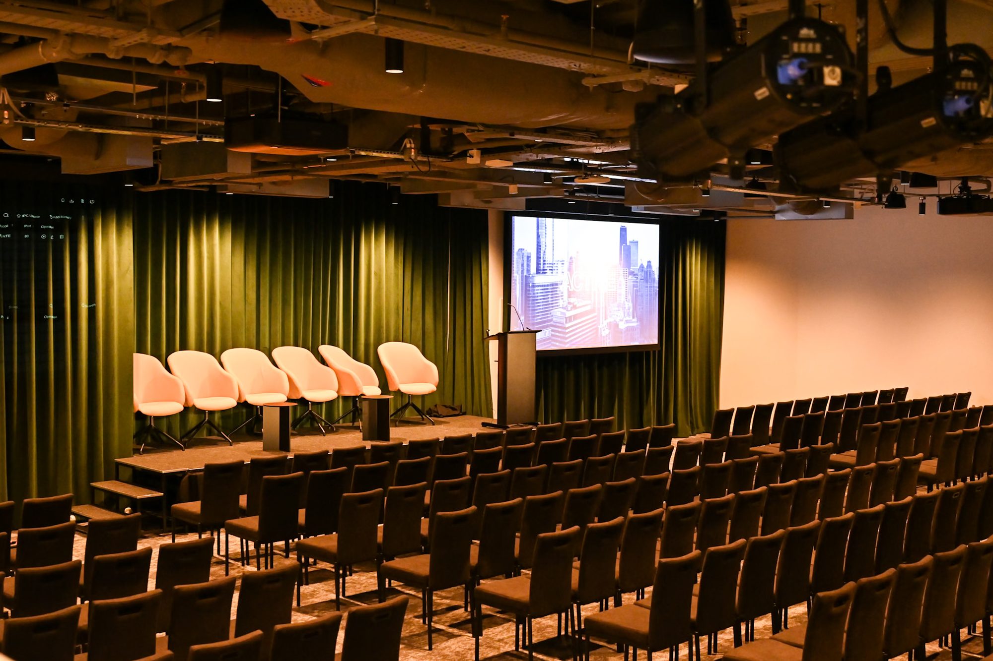 Auditorium with panel stage at One Basinghall
