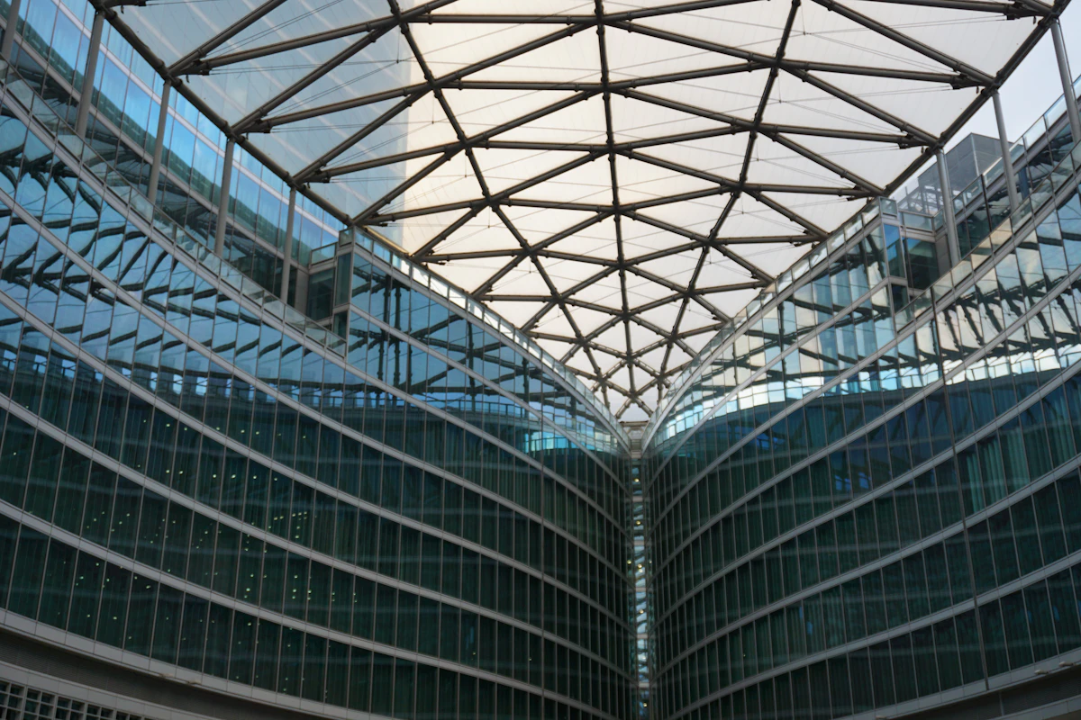 Modern office building with a white and blue glass facade