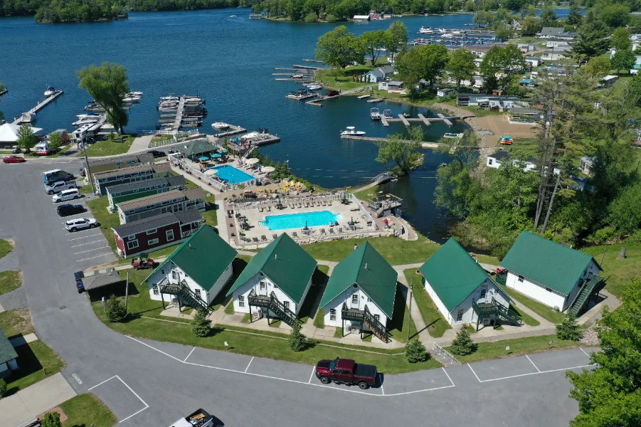 Aerial view of chalets, Cottages, and the St. Lawrence River at Swan Bay Resort and Marina