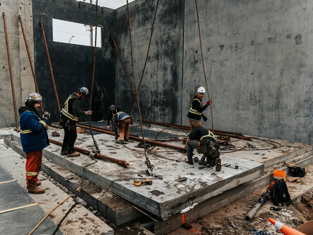 foundations workers in concrete base