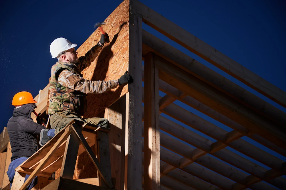 Exterior/Siding - carpenter working outside on house