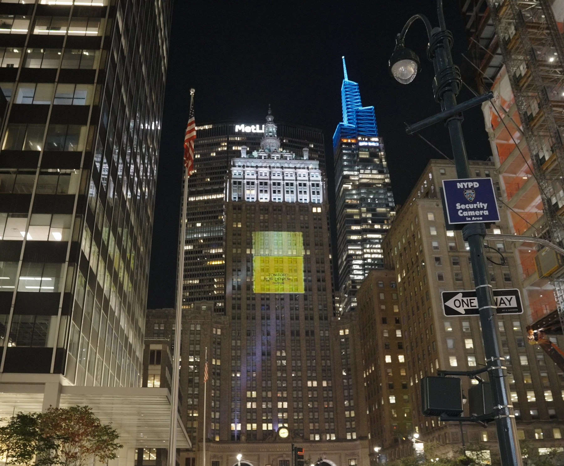 Noir Extreme imagery projected onto the Helmsley Building, seen from the street.