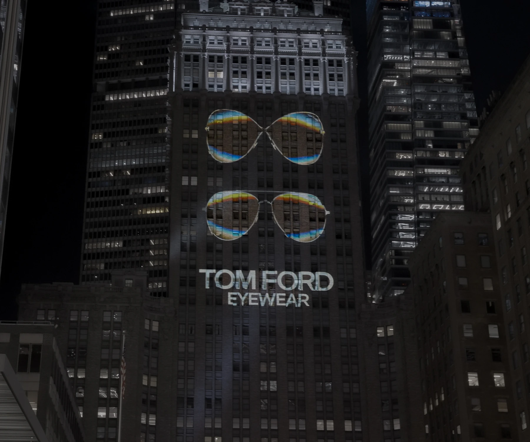 A closer view of the Tom Ford Eyewear projection on the Helmsley Building.