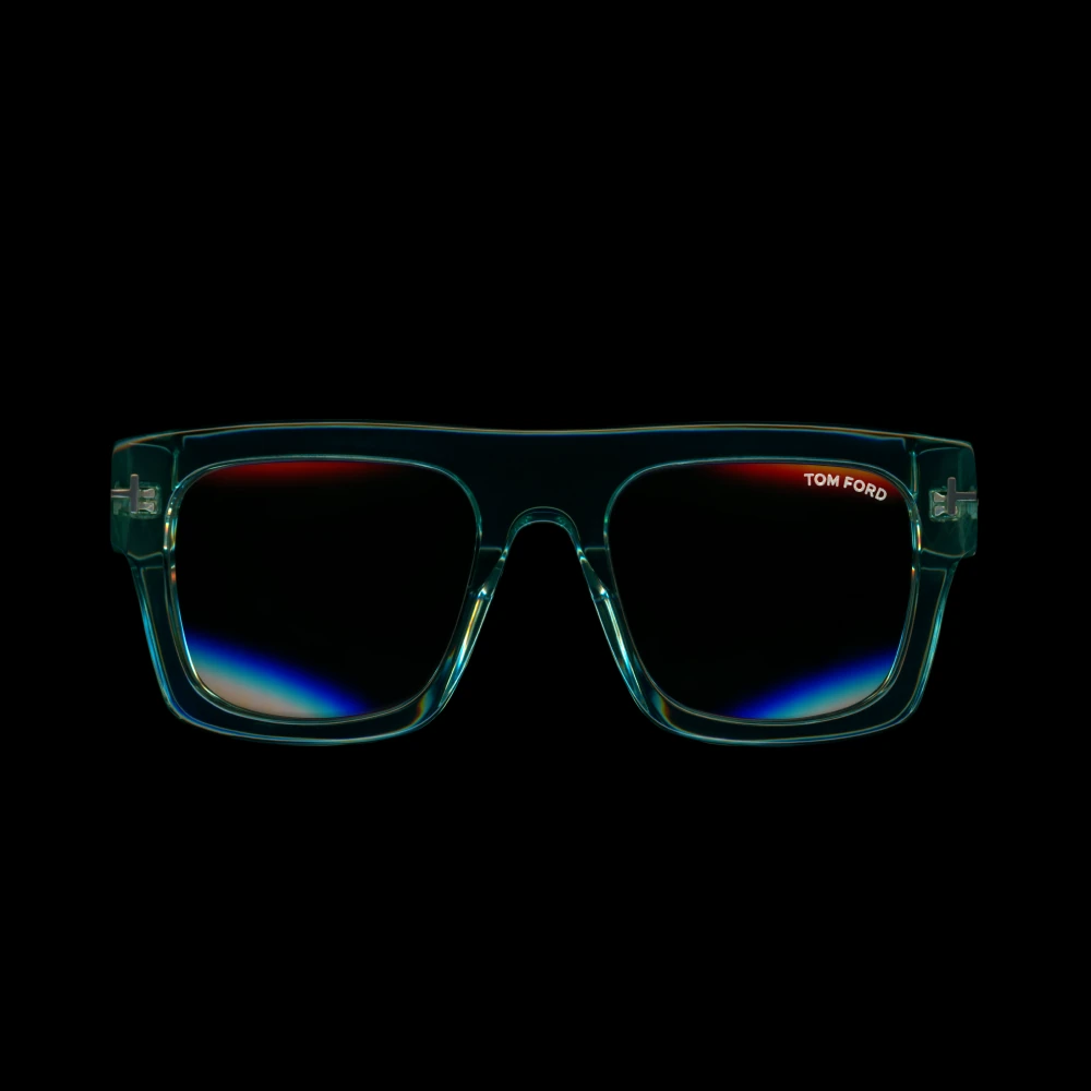 Square green Tom Ford frames with refracted light.