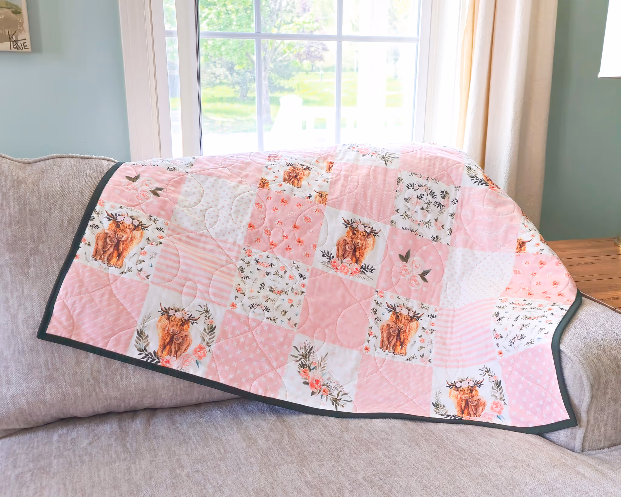 Pink quilt with flower squares
