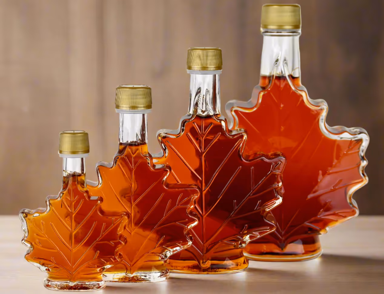 Pure Maple Syrup in  sized maple leaf jugs