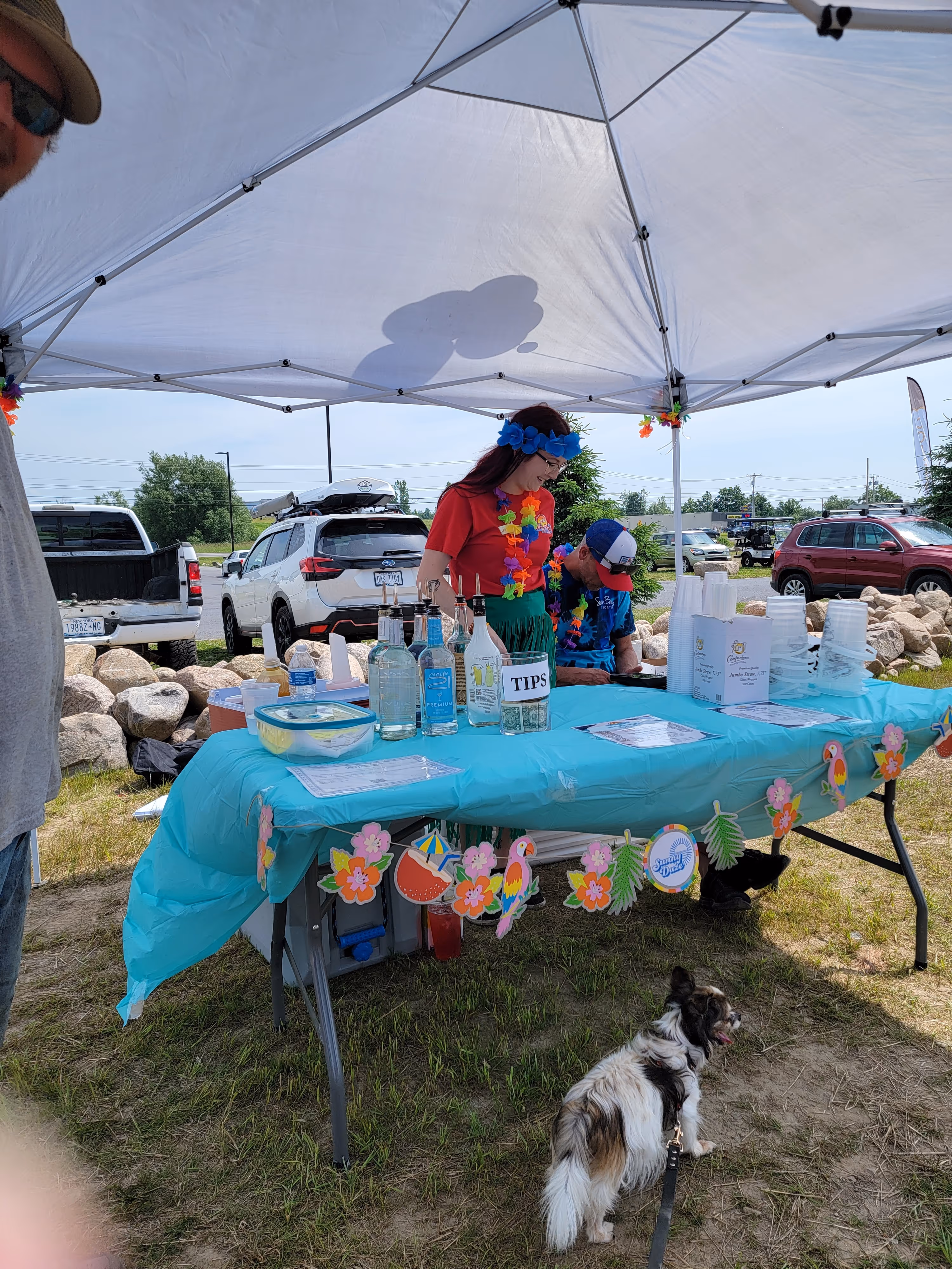 Cherry the long haired Chihuahua checks in with Vendors