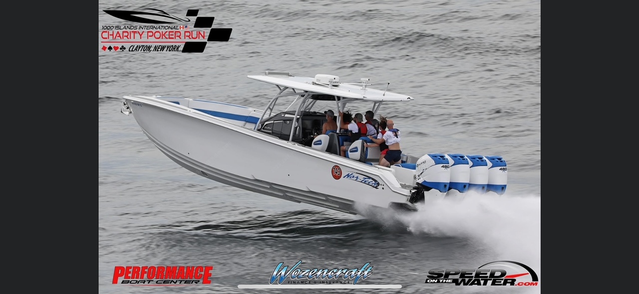 1000 Islands Charity Poker Run 2025: Boats race on the St. Lawrence River with scenic islands and shoreline in the…