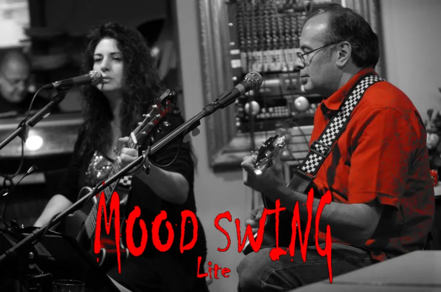 Live Music by Mood Swing, 2024: Mood Swing performs at the Tiki Bar with good vibes by the water.