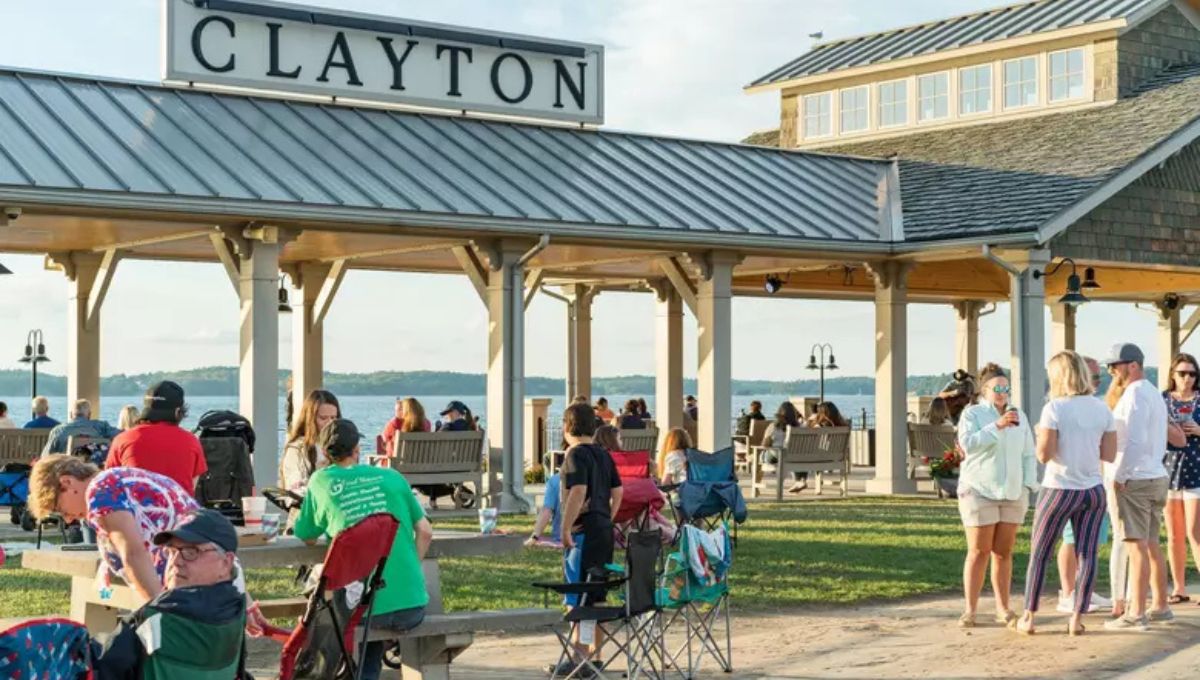 Frink Park waterfront green space with St Lawrence River views picnic areas and Adirondack chairs in Clayton New York
