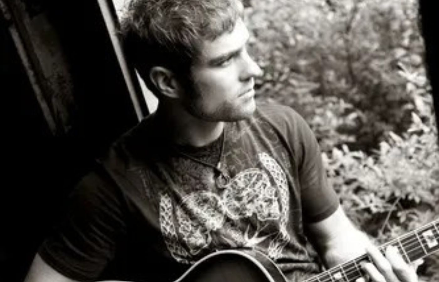Live music performance by Brian Alexander at Swan Bay Resort's Tiki Bar.