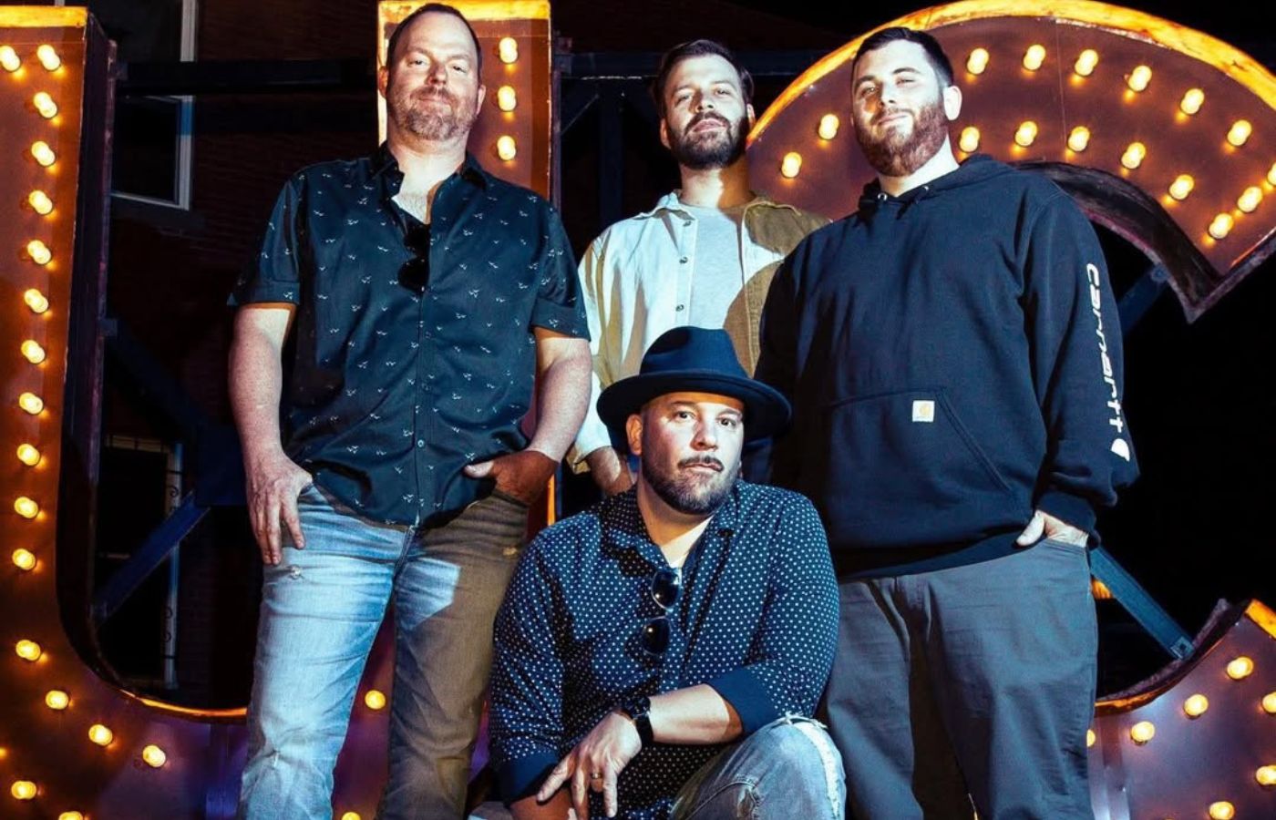 Live music performance by Uncle Charlie and the Meatballs at Swan Bay Resort's Tiki Bar.