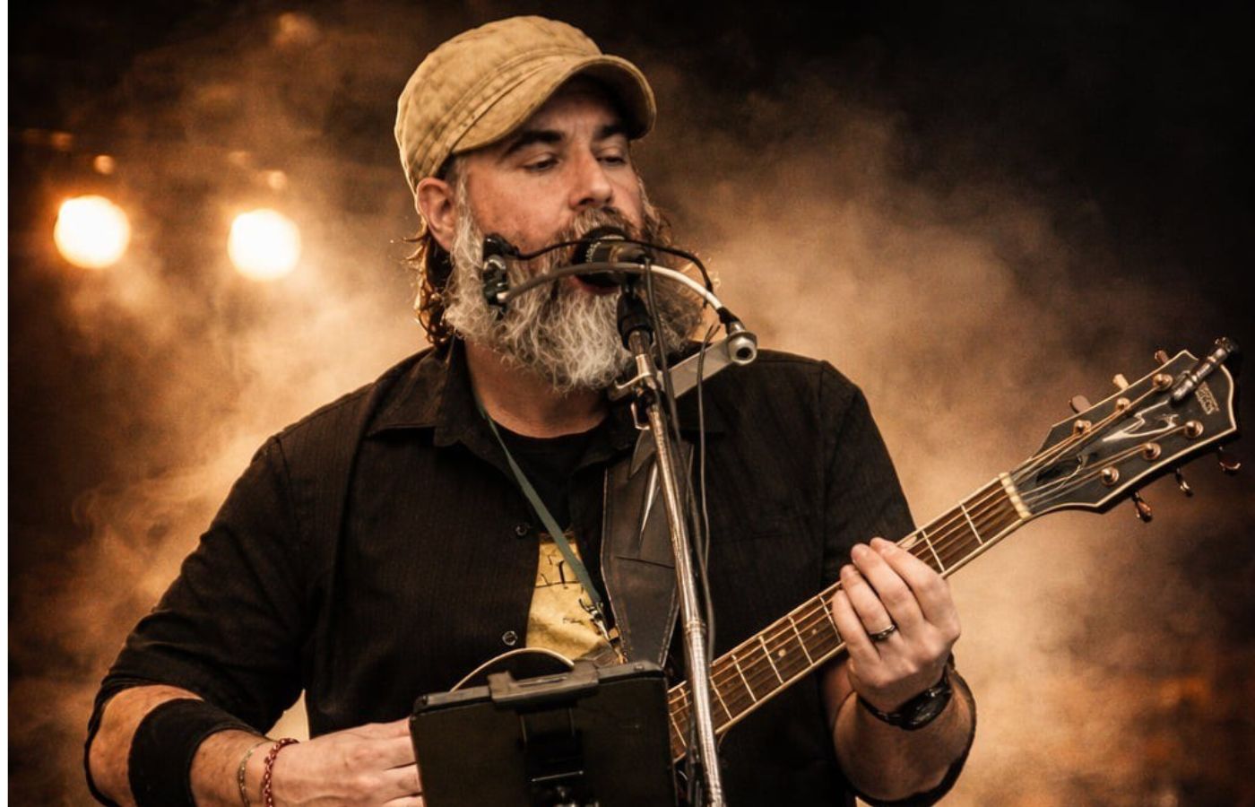 Live music performance by Tony Long Toes at Swan Bay Resort's Tiki Bar.