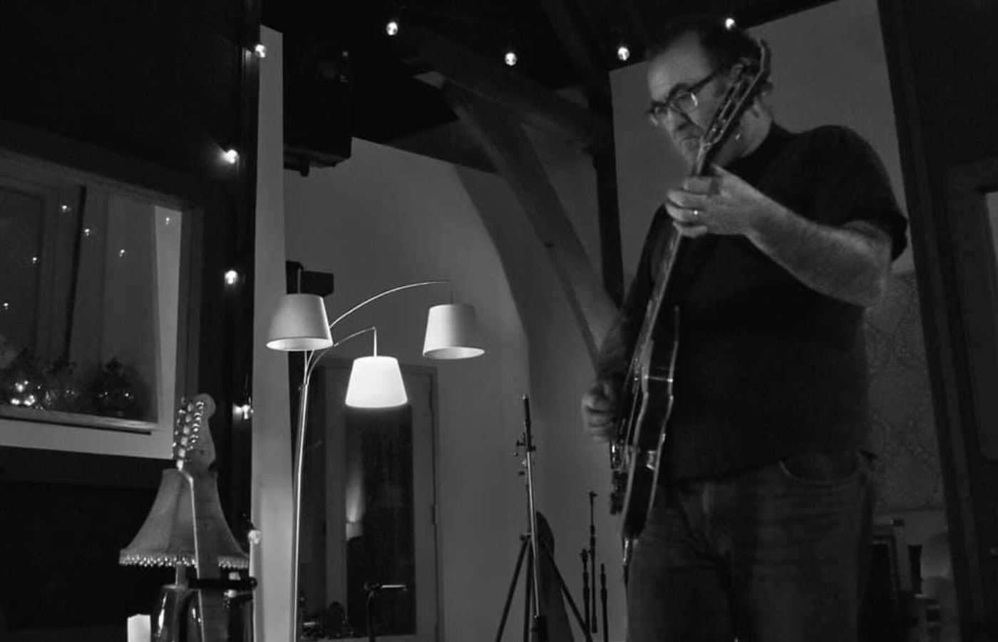 Live music performance by Bryan Honeywell at Swan Bay Resort's Tiki Bar.