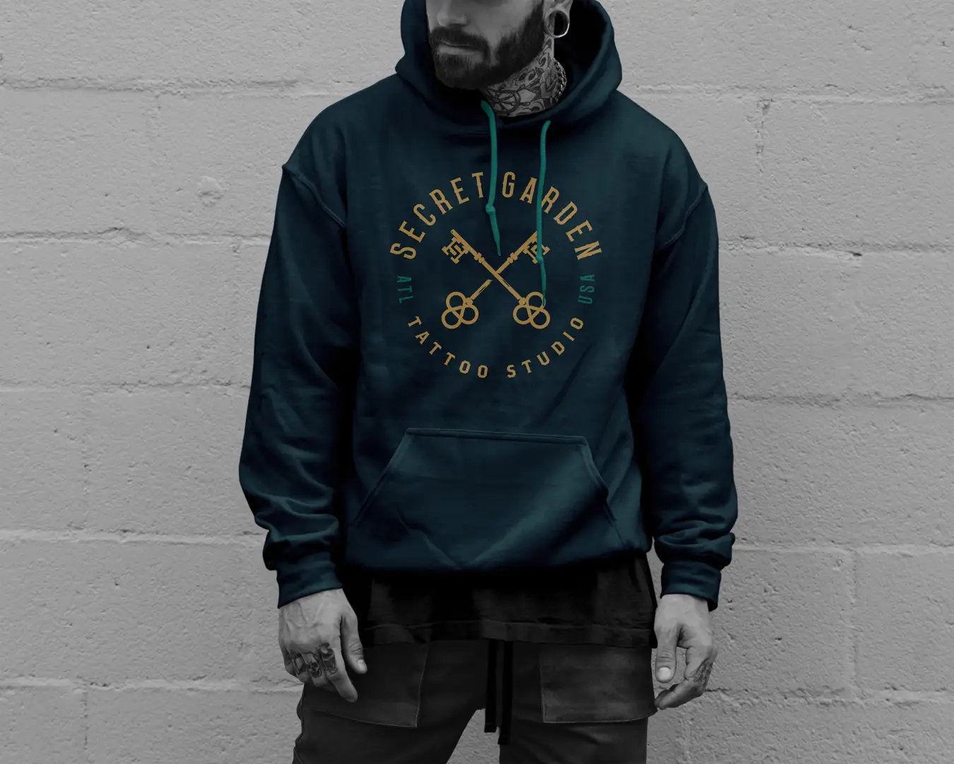 Example of Secret Garden branding applied to a dark hoodie