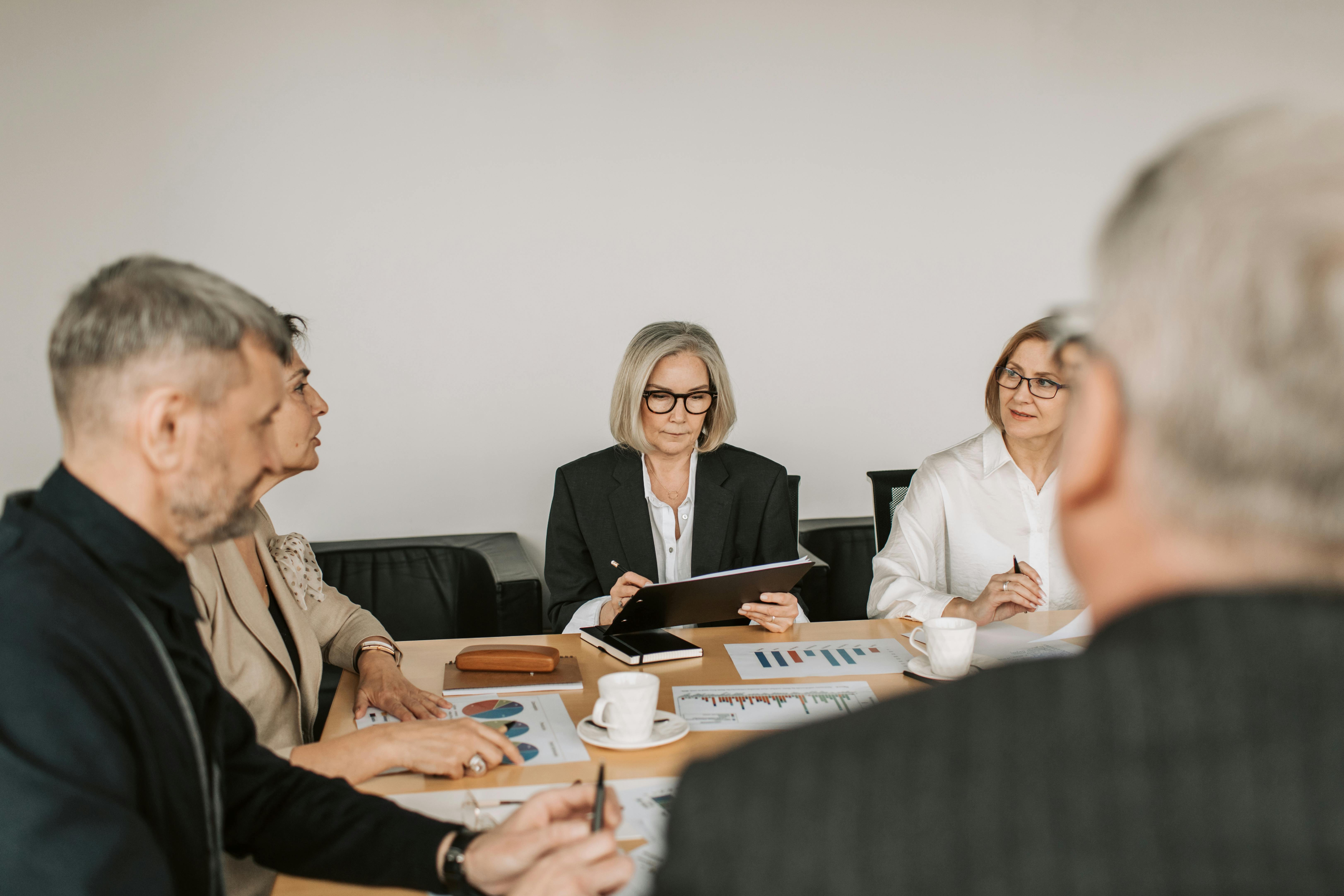 Businesses discussing ESG sustainability