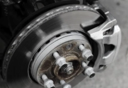 snow chains on car tire in winter
