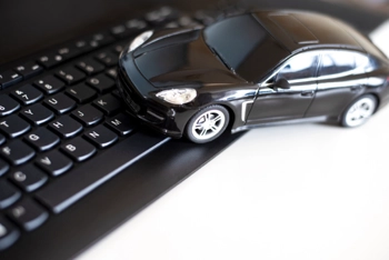 toy car on top of a keyboard