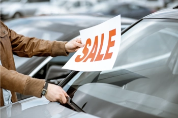 car with for sale sign