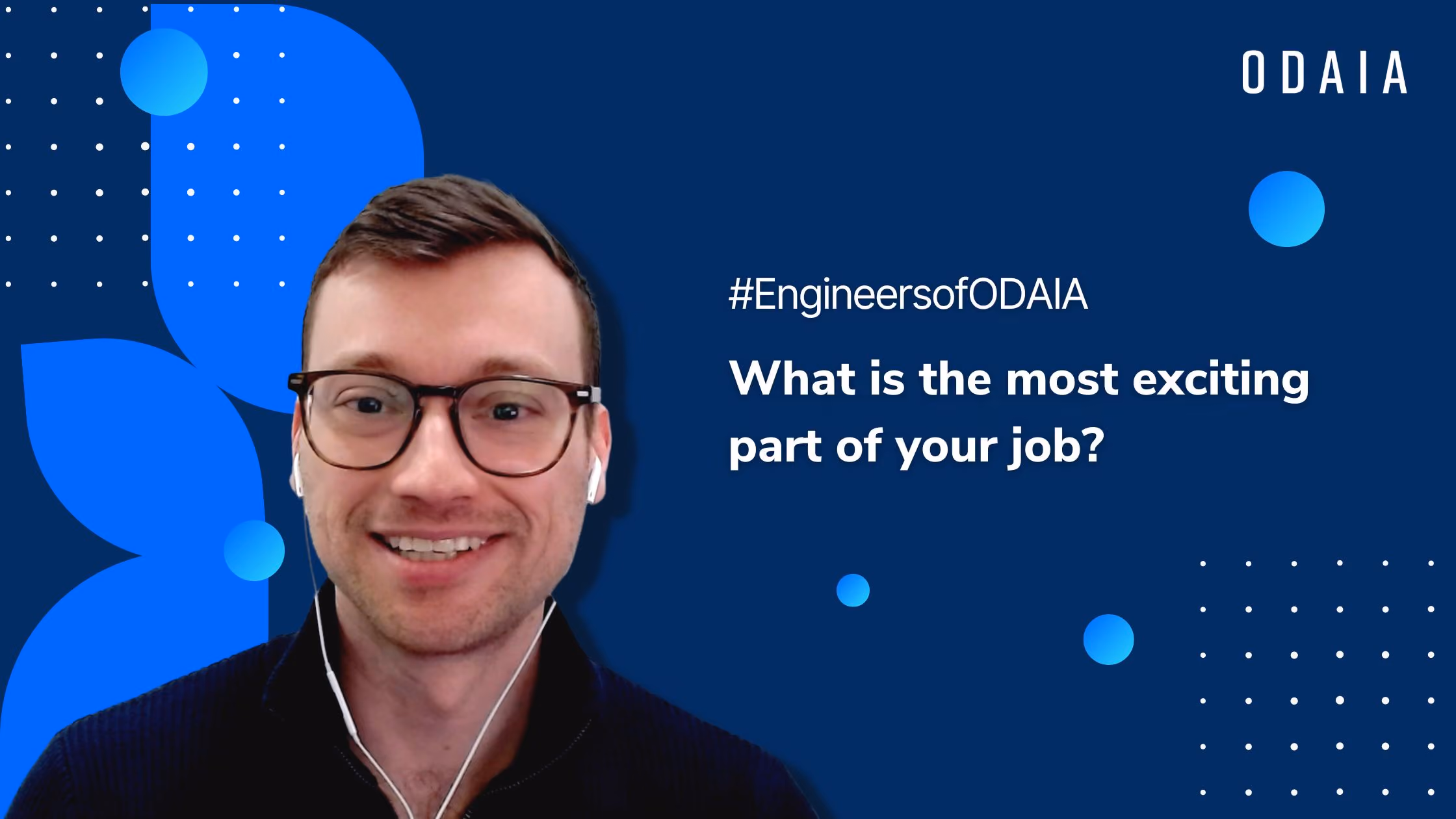 Smiling man wearing glasses and earbuds with text reading 'What is the most exciting part of your job?' and #EngineersofODAIA hashtag on blue background.