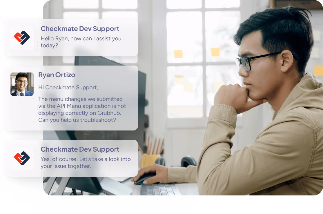 Man in glasses sitting at a desk using a computer, with overlaid chat messages discussing menu display issues on Grubhub.