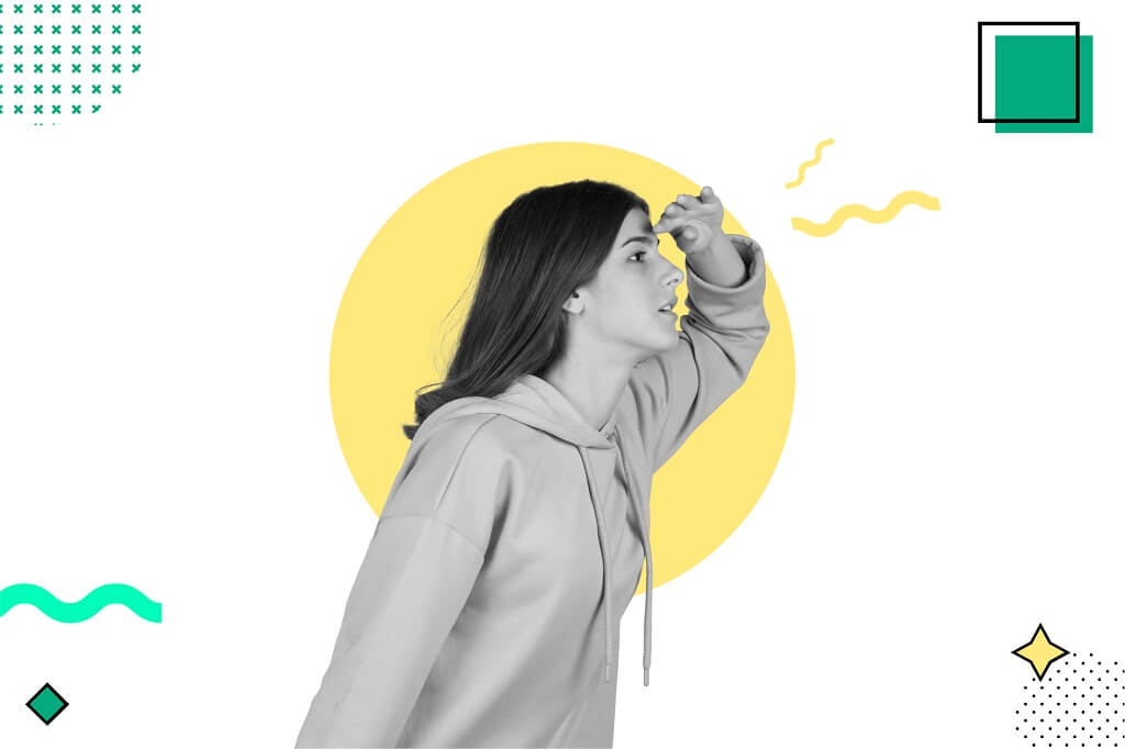 Woman in hoodie looking forward with hand shading eyes against yellow circle background and colorful geometric shapes