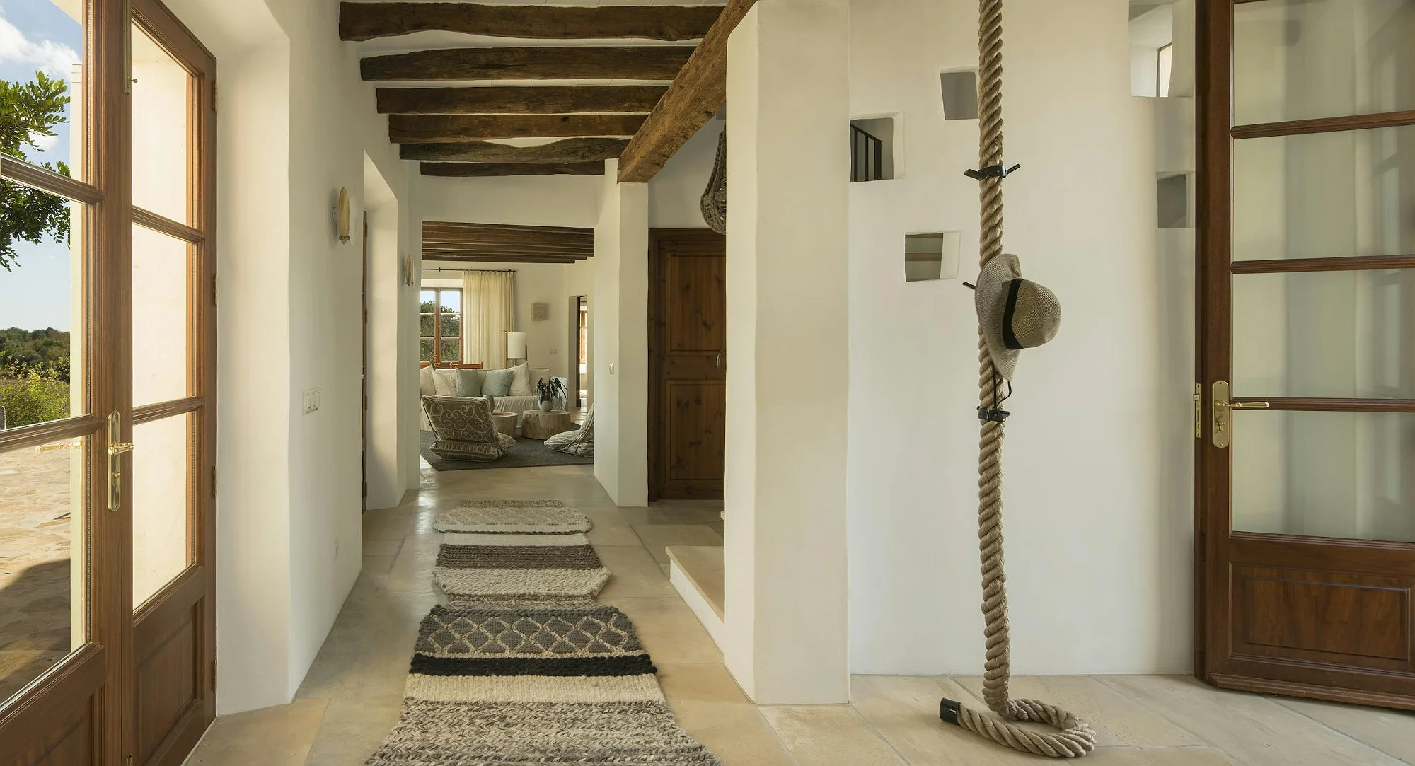Interior hallway with wooden beams at ByMilagro luxury holiday villa in Mallorca