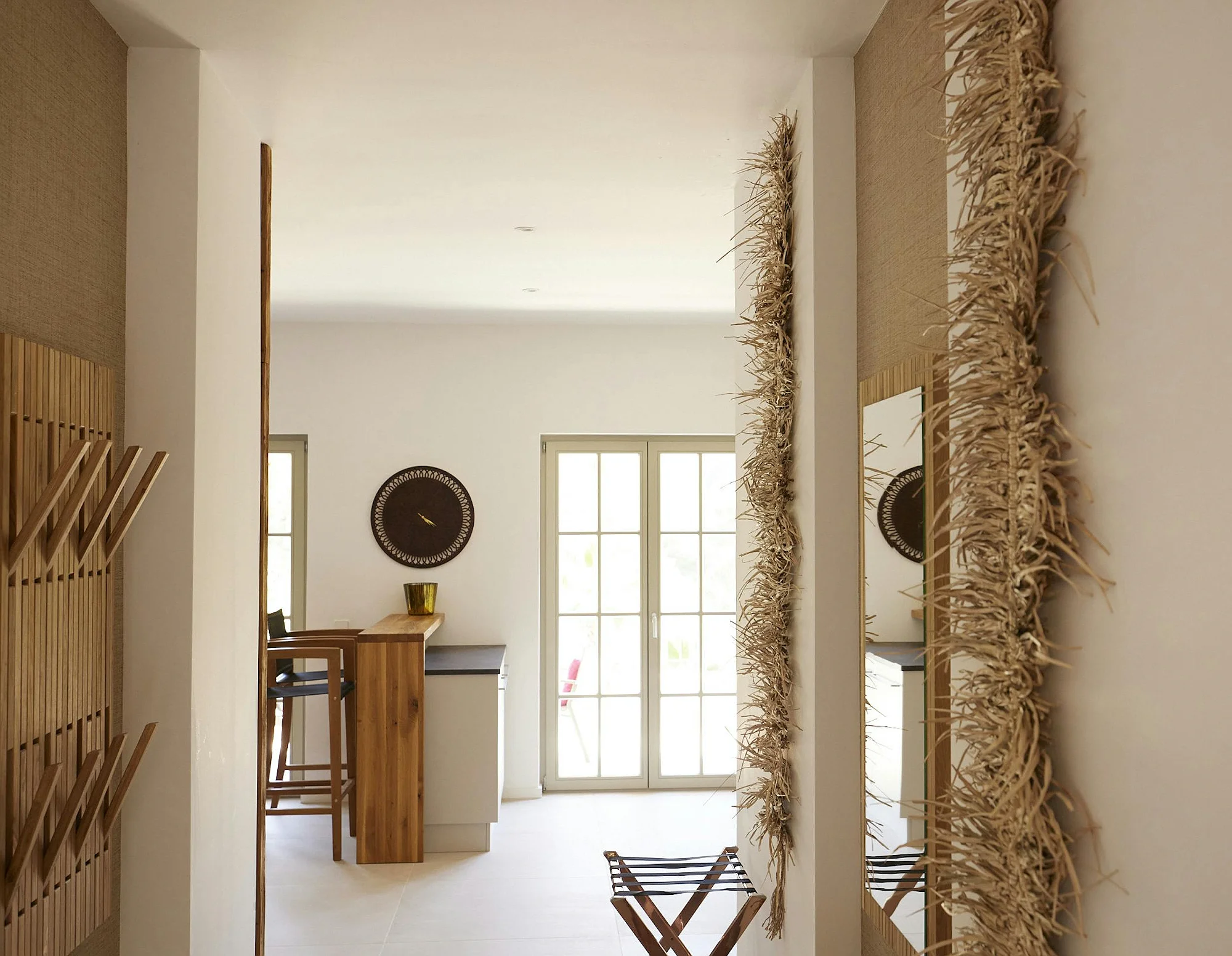 Hallway with natural decor and bright light at ByMilagro luxury rental villa Mallorca