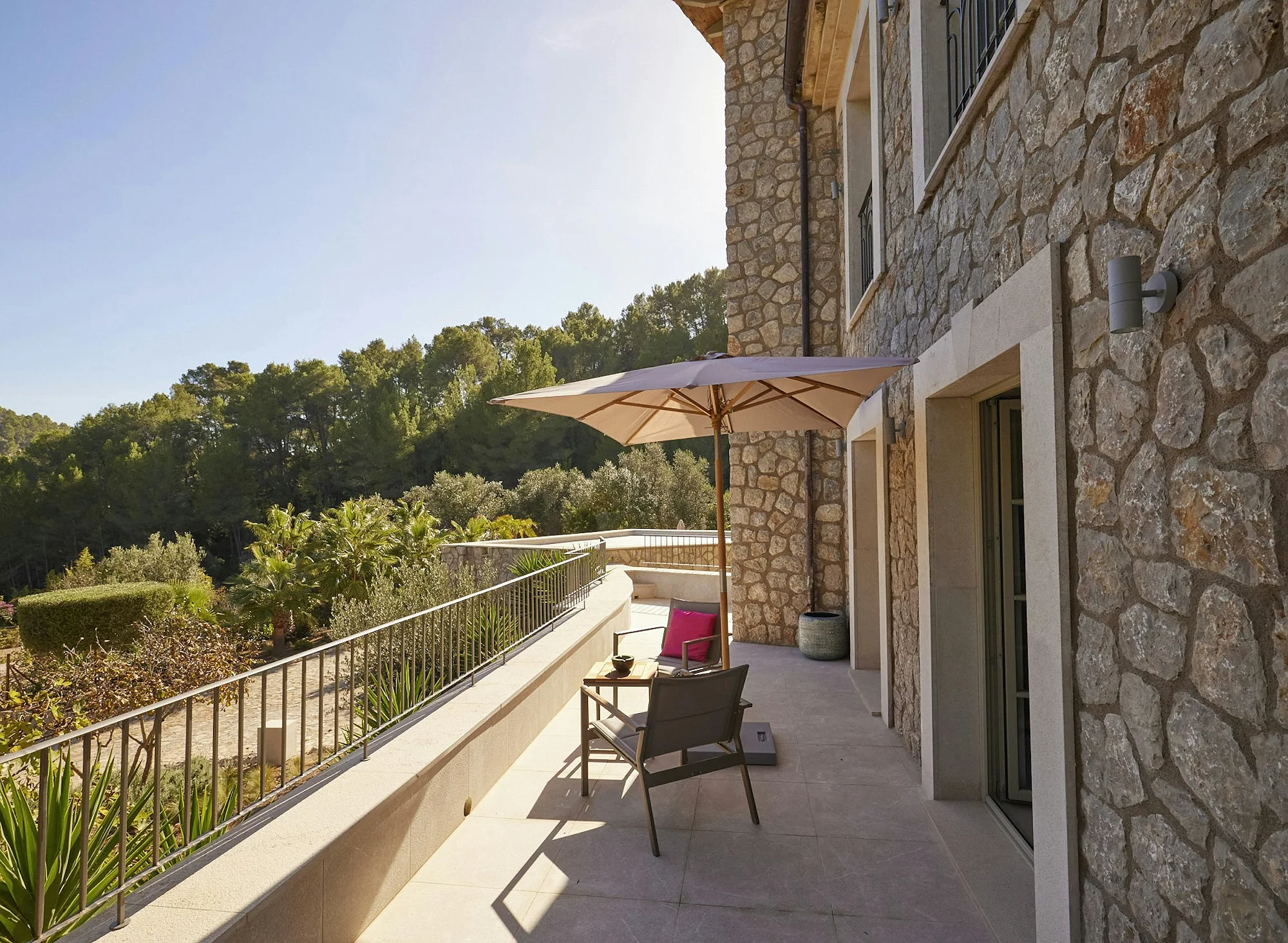 Private terrace with umbrella and mountain views at ByMilagro luxury villa Mallorca