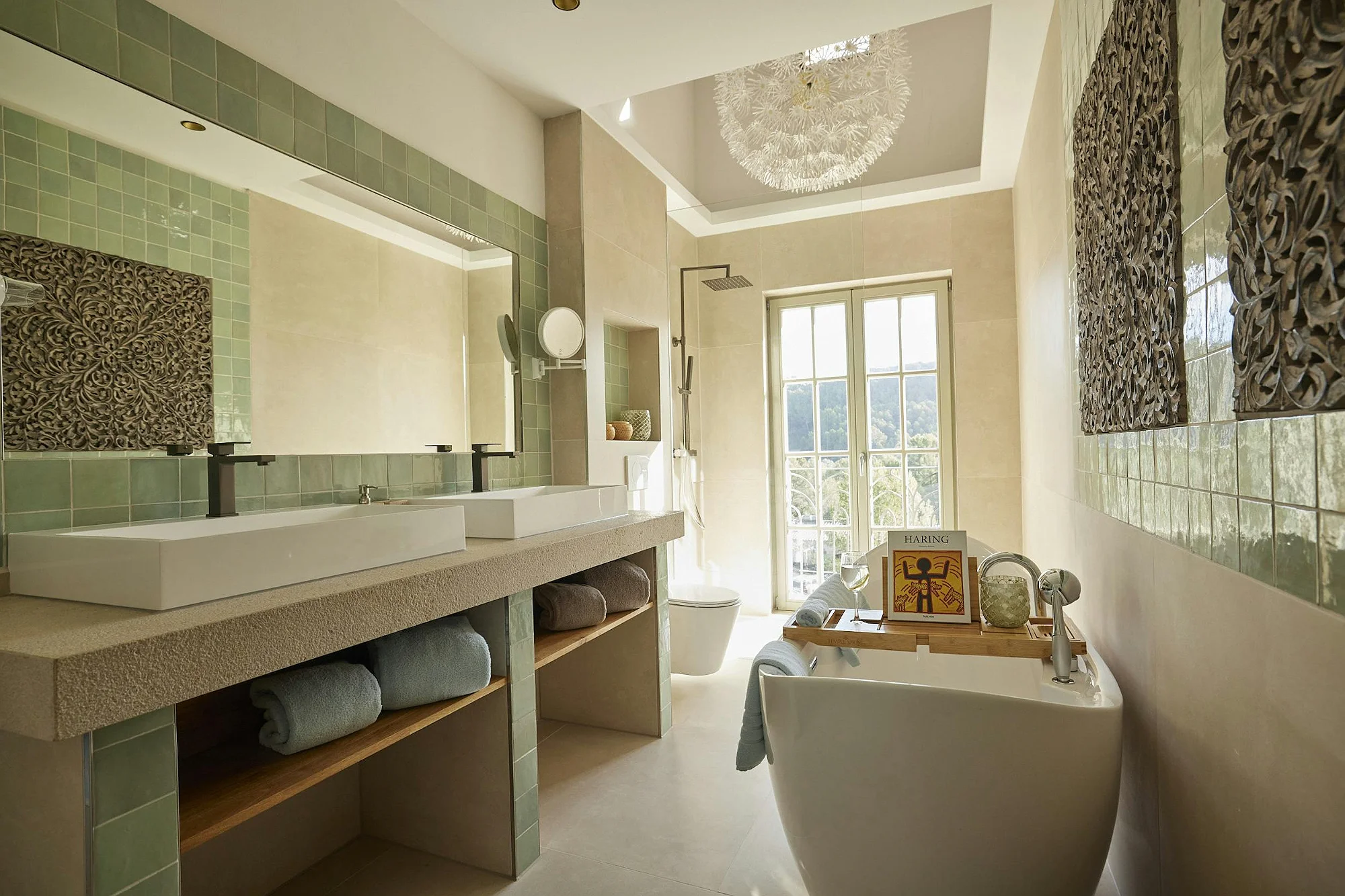 Luxury bathroom with bathtub and double sinks at ByMilagro villa rental Mallorca