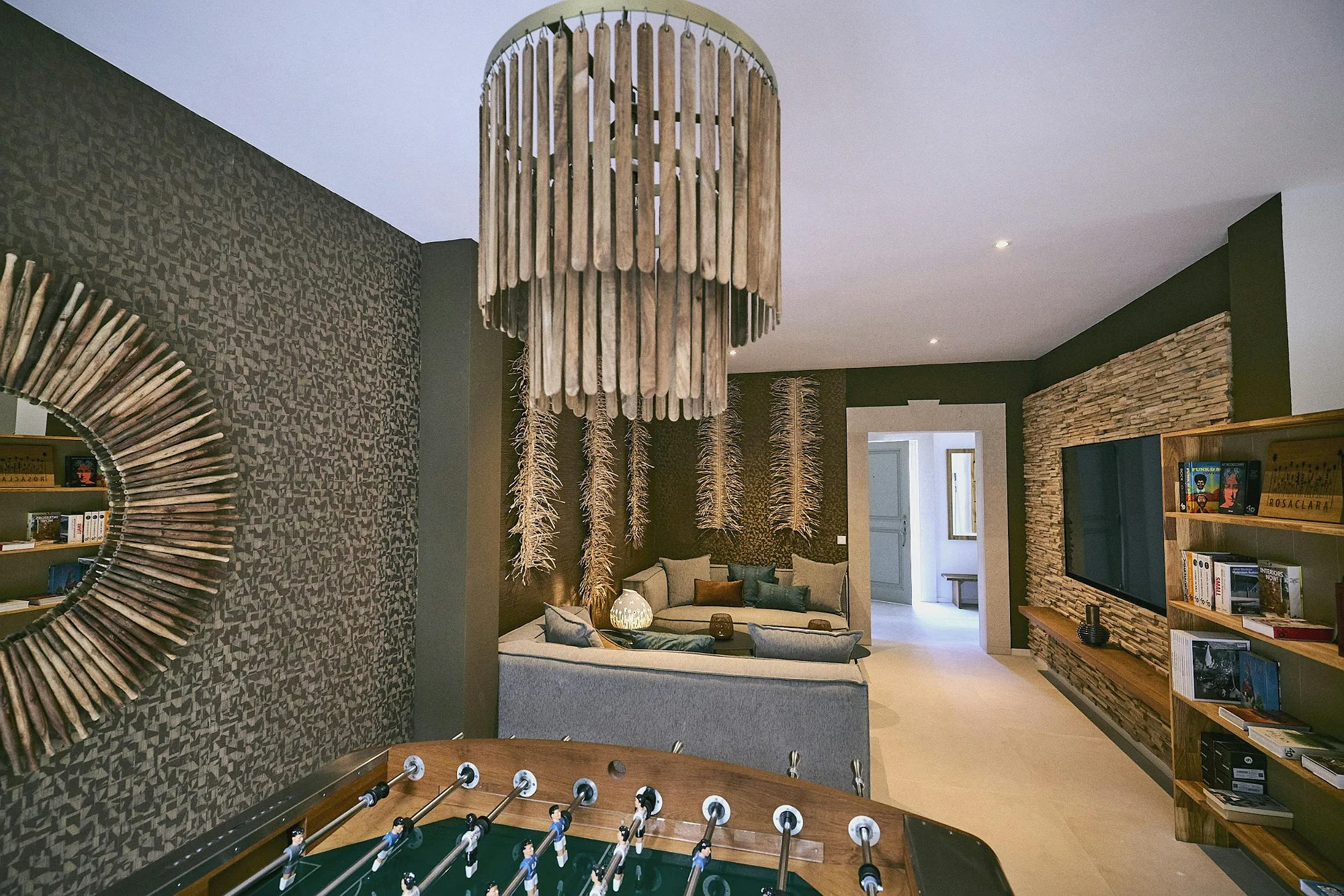 Game room with foosball table, lounge and modern decor in ByMilagro holiday villa Mallorca