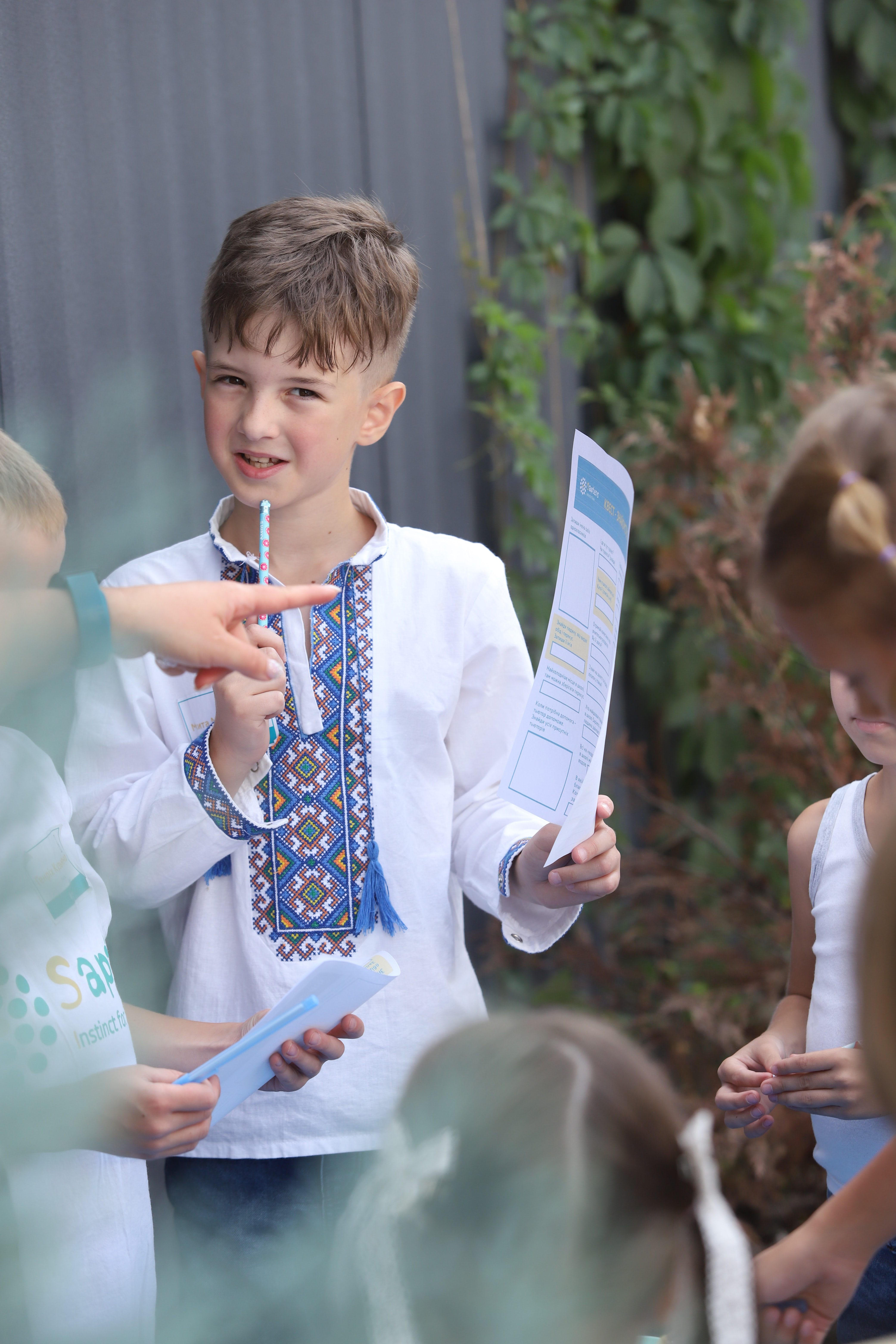 A boy with a certificate