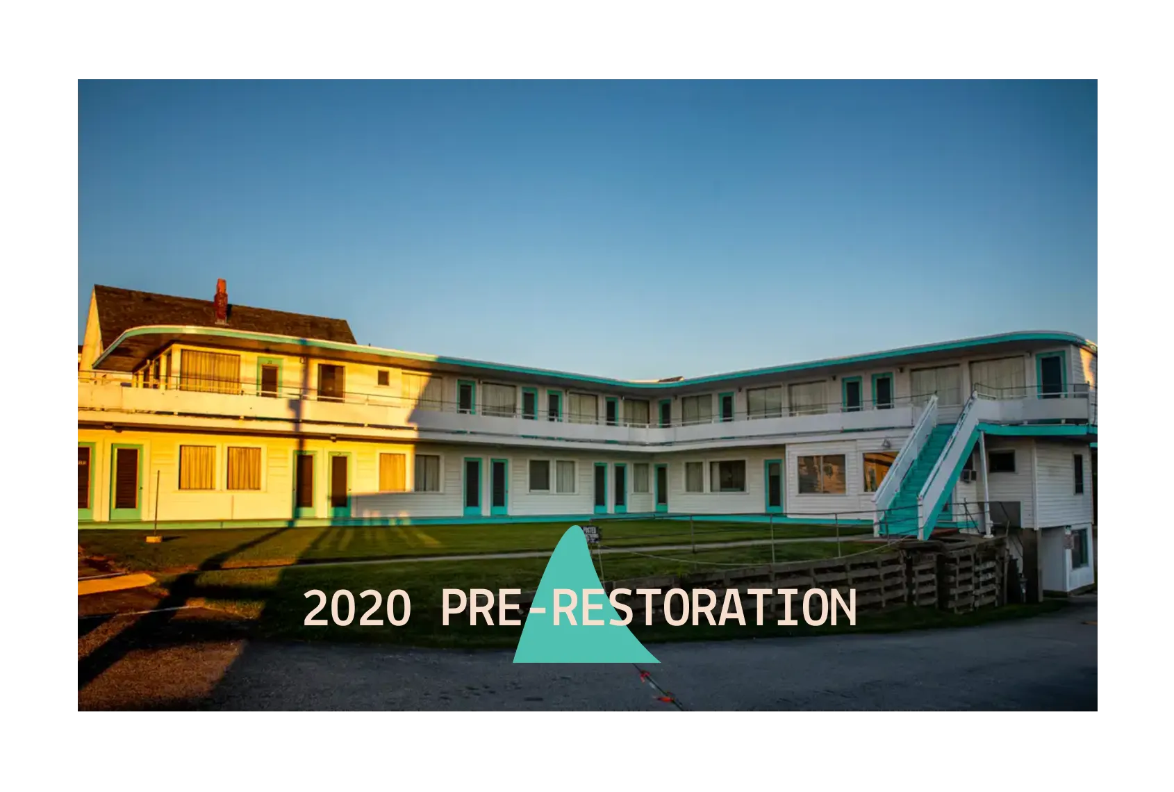 Two-story motel building at sunset with text overlay reading '2020 Pre-Restoration'.