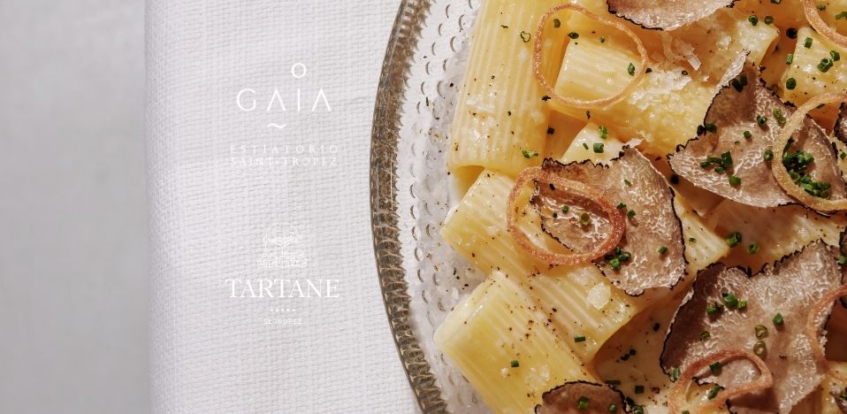 Truffle pasta dish at Gaia Saint-Tropez, featuring the logos of La Tartane and Gaia Saint-Tropez