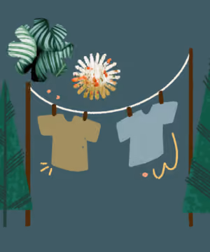 Two shirts hanging on a clothesline