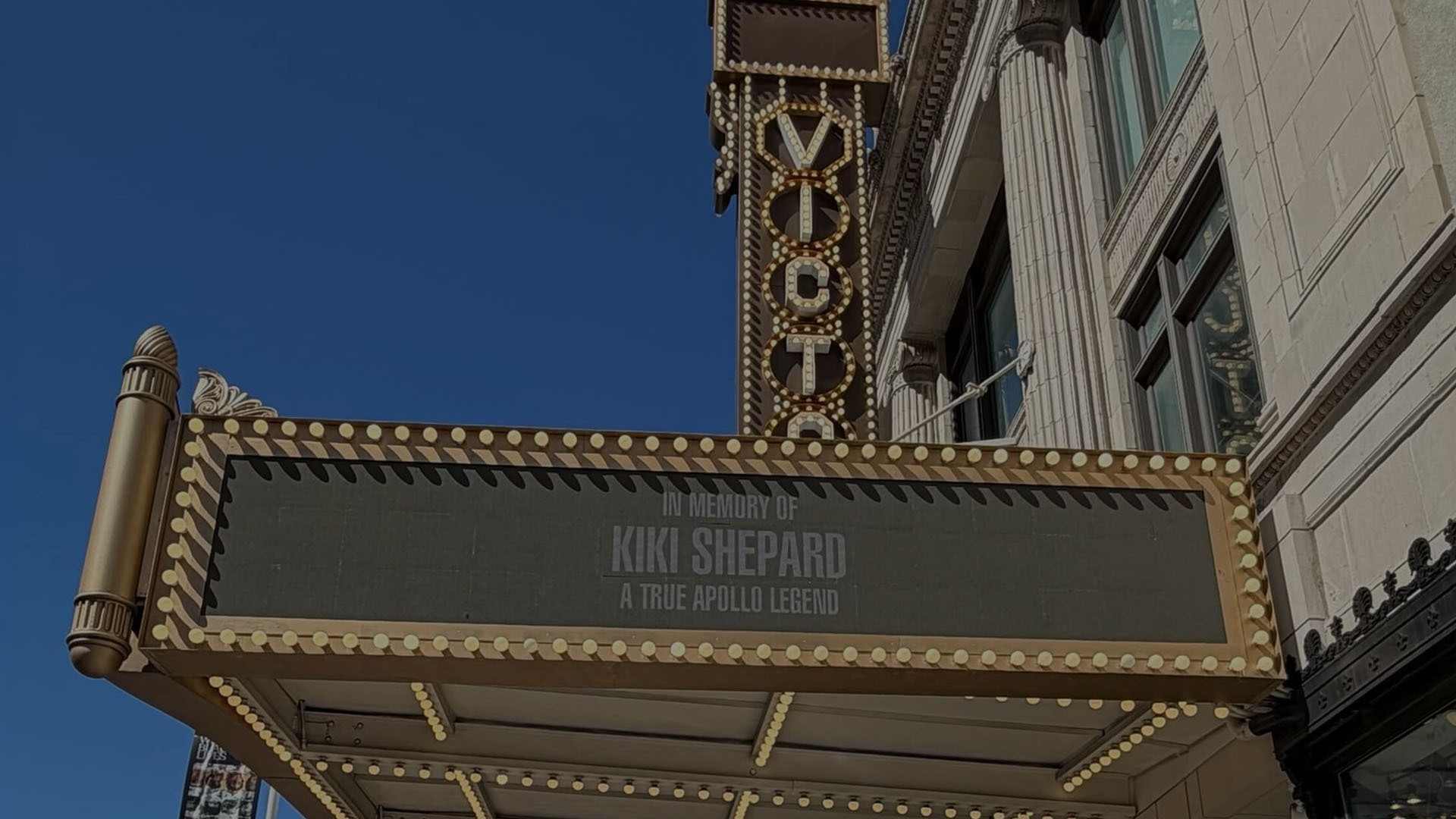 Apollo Theater marquee reading “In Memory of Kiki Shepard, A True Apollo Legend.”