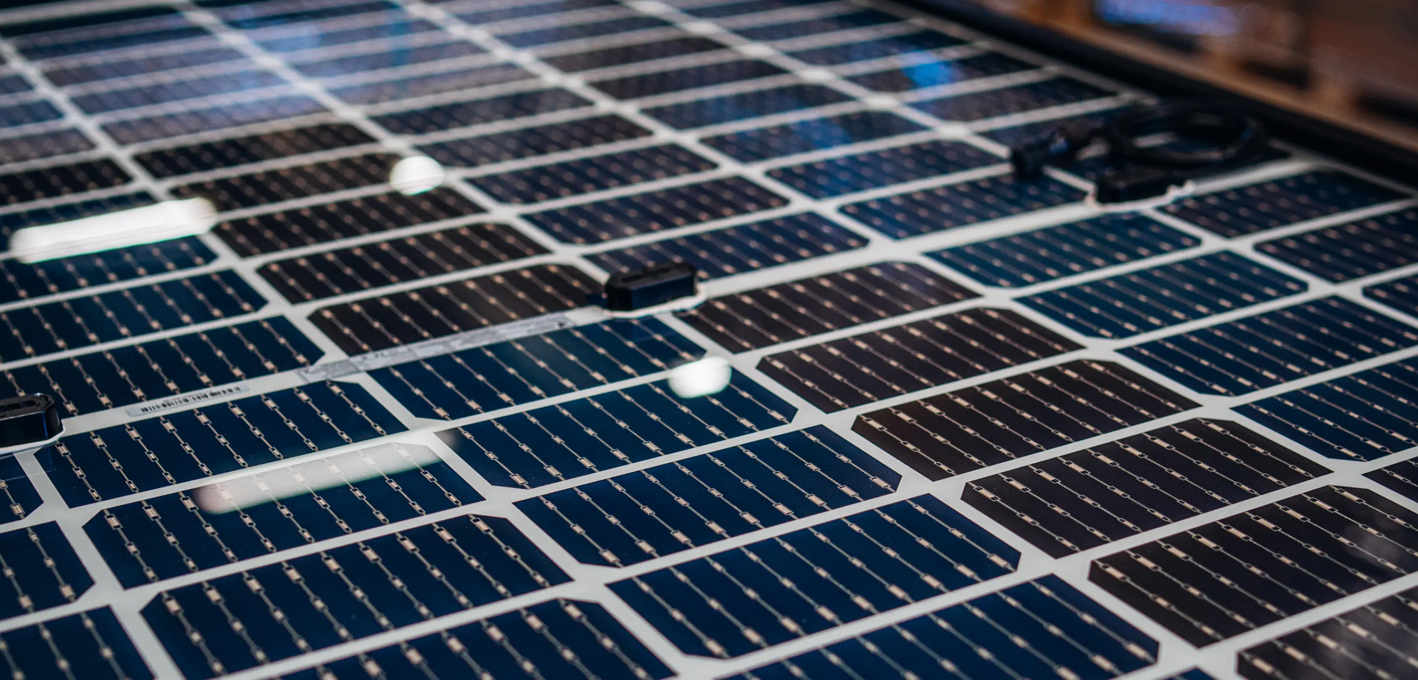 A close up of a solar panel on a table.