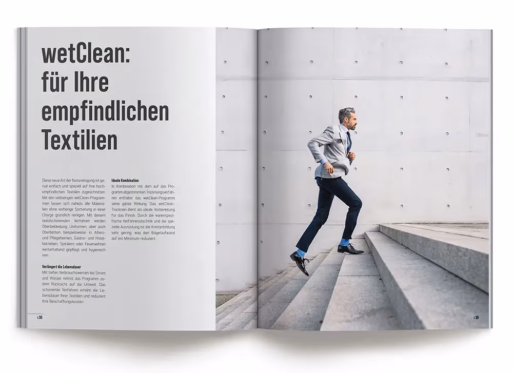 Schulthess Katalog mit Mann auf Treppe – Werbeagentur Zürich