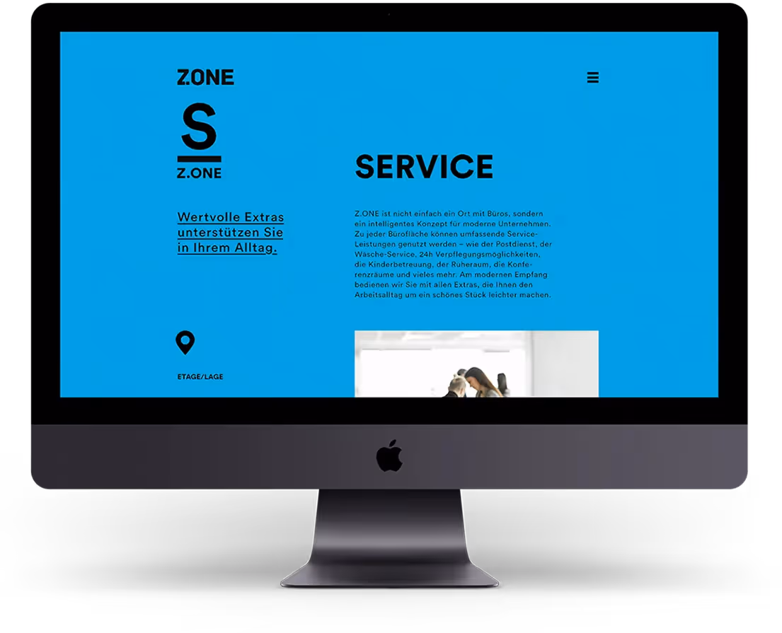 Zone Website Design in blau Mockup auf Desktop – Webagentur Zürich