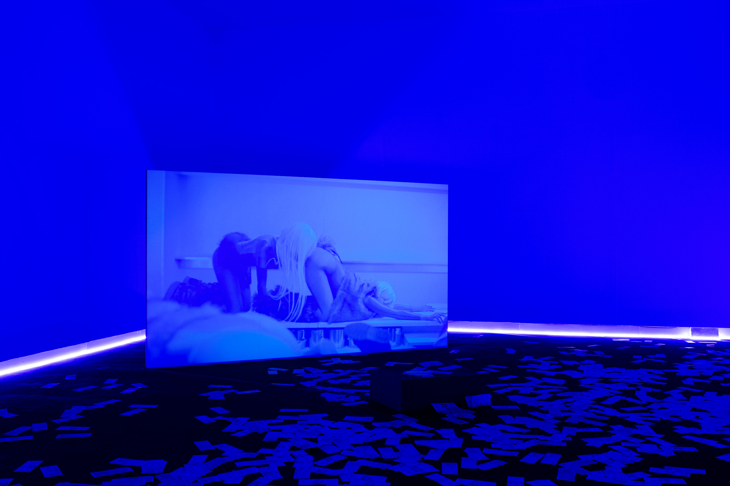 Umi Ishihara, 'Nocturnal Breath', 2026, video installation with sound, prop money, UV light, 4 min. Photograph by Jules Lister.