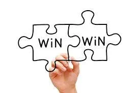 Hand drawing two interlocking puzzle pieces labeled WIN WIN, illustrating the museum and vendor partnership the post describes.