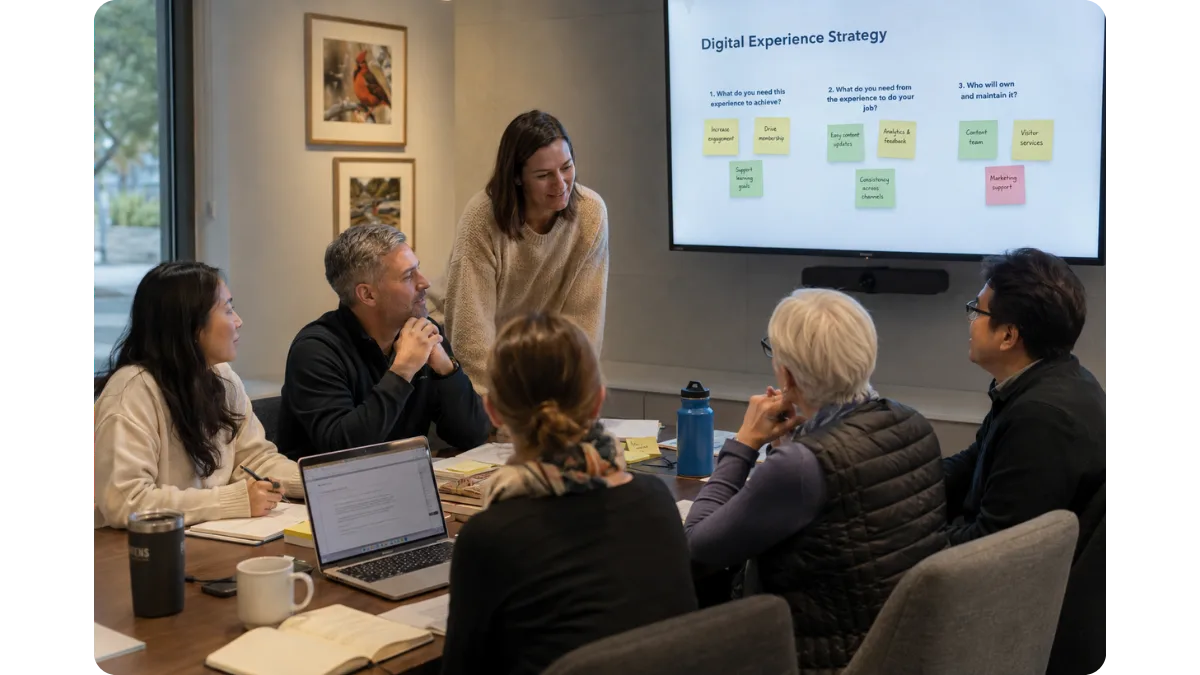 Museum staff from multiple departments collaborating on a digital storytelling strategy during a planning meeting.