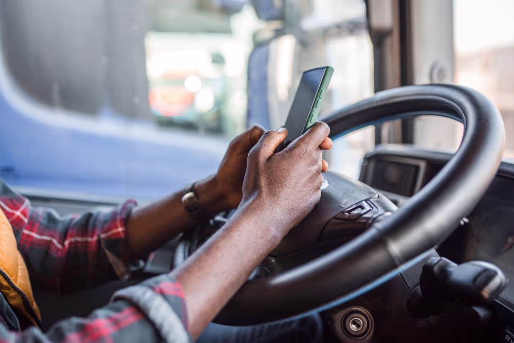 Two hands holding a phone