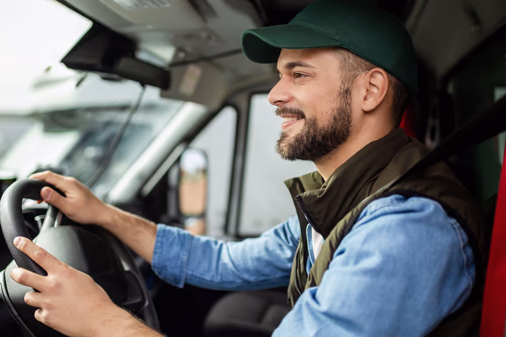 A man driving a truck