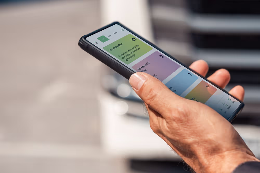 A person typing on their smartphone