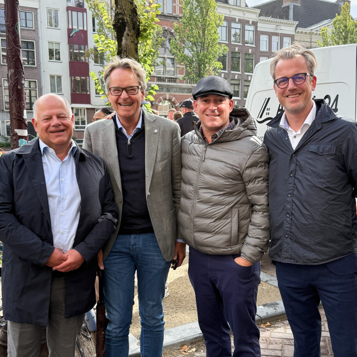 4 men at a company retreat in amsterdam